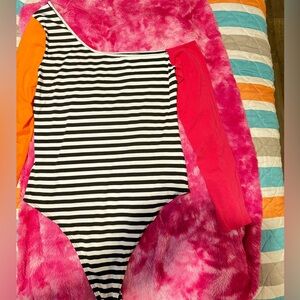 bodysuit from SHEIN, large, striped black and with pink and orange sleeves.